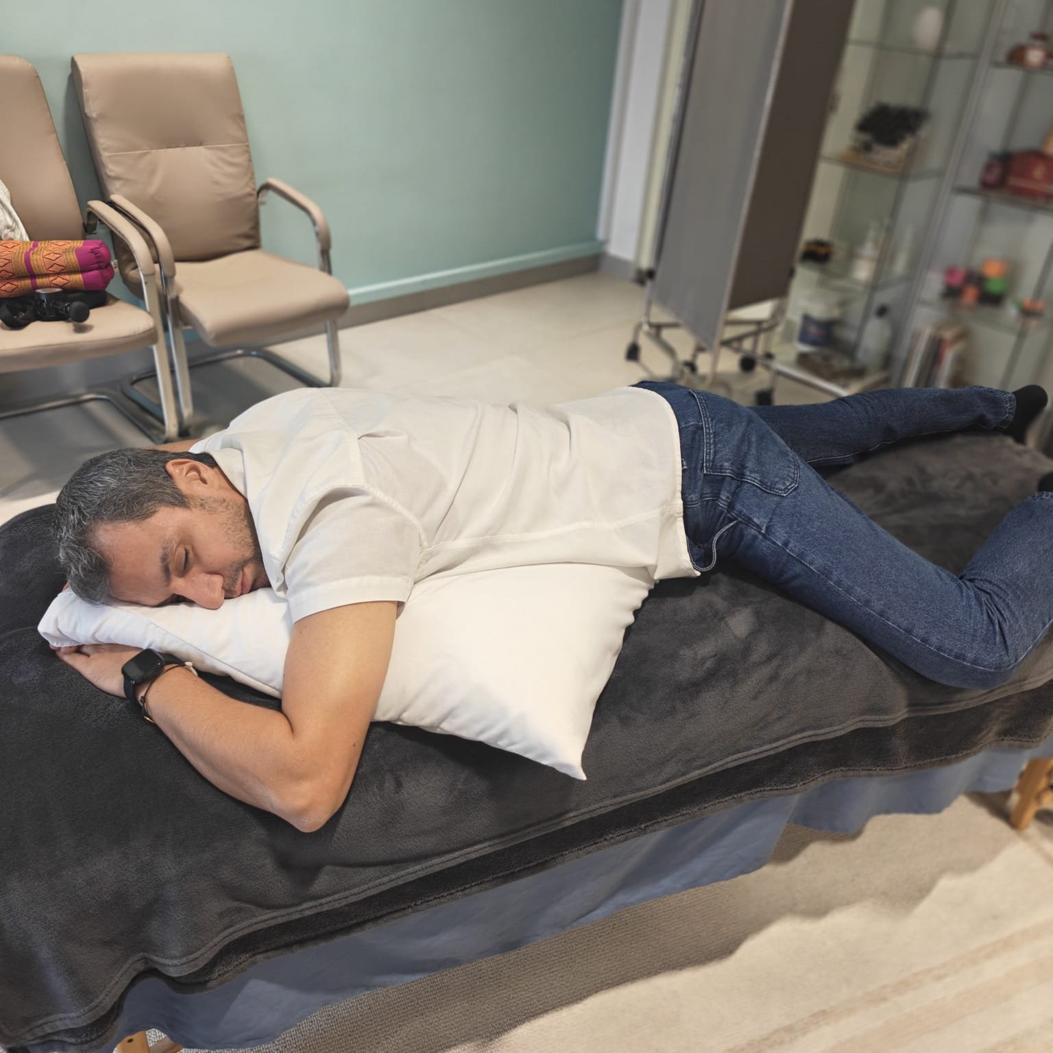 Person sleeping on their side with proper spinal alignment